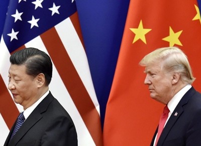 Chủ tịch Trung Quốc - Tập Cận Bình và Tổng thống Mỹ - Donald Trump. Ảnh: Kyodo.