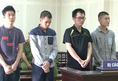Bốn bị cáo tại phiên tòa hôm nay. Ảnh: Quang Khải