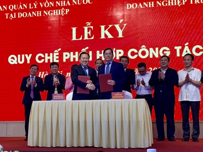 Lãnh đạo 2 đơn vị tại lễ ký kết. Ảnh:VGP/Huy Thắng.