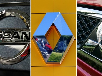 Logo 3 hãng xe trong liên minh - issan, Renault và Mitsubishi. Ảnh: Reuters.