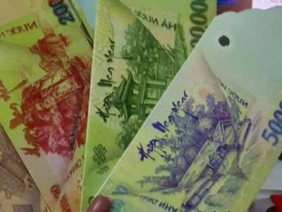 Việc in ấn, mua bán bao lì xìhình tiền Việt Là hành vi vi phạm. Ảnh:PV.