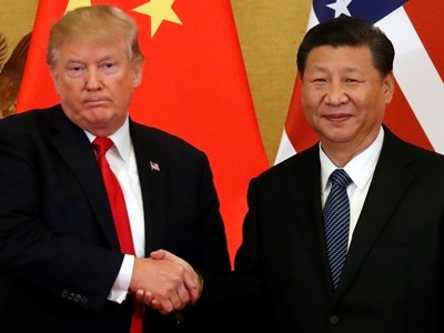 Tổng thống Mỹ Trump (trái) và Chủ tịch Trung Quốc Tập Cận Bình ở Bắc Kinh tháng 11/2017. Ảnh: Reuters.