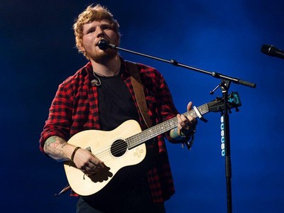 Ed Sheeran đang trên đường trở thành tỷ phú USD. Ảnh: Getty.  