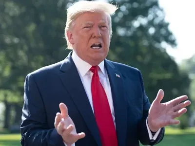 Tổng thống Mỹ Donald Trump trả lời báo chí tại Nhà Trắng hôm nay. Ảnh: AFP.