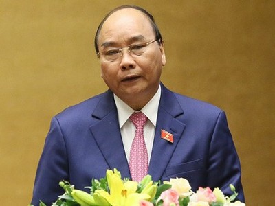 Thủ tướng Chính phủ Nguyễn Xuân Phúc trình bày Báo cáo tại phiên khai mạc kỳ họp thứ 8 Quốc hội khóa XIV.