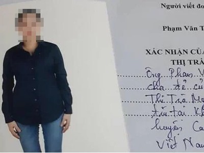 Lá đơn của ông Phạm Văn Thìn đính kèm ảnh con gái Phạm Thị Trà My. Ảnh:Đức Hùng.