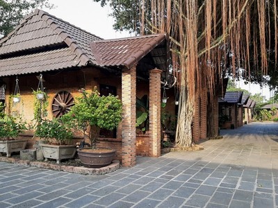 Dãy phòng lưu trú trong resort Tràm Chim. Ảnh: Phương Thảo.