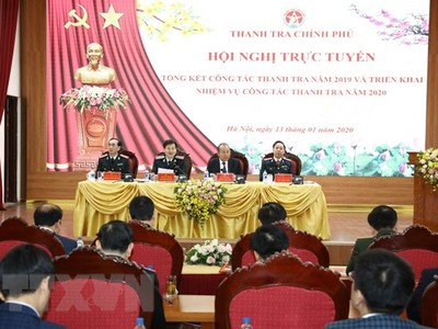 Phó Thủ tướng Thường trực Trương Hòa Bình với lãnh đạo Thanh tra Chính phủ chủ trì Hội nghị. (Ảnh: Văn Điệp/ TTXVN)