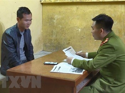 Đối tượng tại cơ quan điều tra. (Ảnh: Đinh Văn Nhiều/TTXVN).