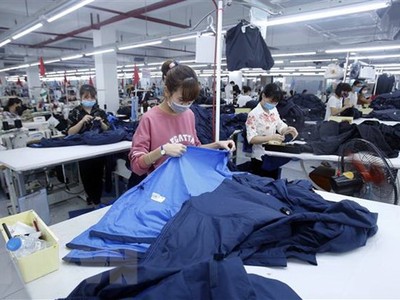 Sản xuất hàng dệt may. (Nguồn: TTXVN).