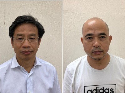 Bị can Nguyễn Xuân Sơn (trái) và Vũ Trọng Hải.