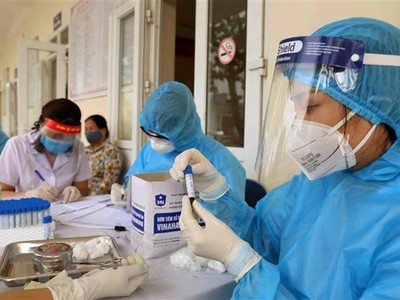 Xét nghiệm nhanh COVID-19. (Ảnh: Vũ Sinh/TTXVN).