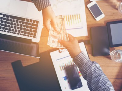 Tài sản ủy thác là danh mục tài sản bao gồm tiền, chứng khoán và các tài sản khác của khách hàng ủy thác. Ảnh: Shutterstock.