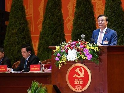 Bộ trưởng Bộ Tài chính Đinh Tiến Dũng phát biểu tham luận tại Đại hội Đảng lần thứ XIII - Ảnh: VGP/Nhật Bắc.