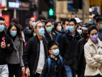 Đeo khẩu trang ở Trung Quốc thời Covid-19. Ảnh: DNA India.