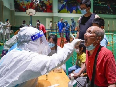 Giới chức Trung Quốc thừa nhận Delta là nguyên nhân gây ra đợt bùng phát Covid-19 hiện nay ở nước này (Ảnh: Tân Hoa Xã).