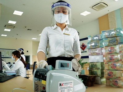 Mới đây, BIDV giảm lãi suât cho vay doanh nghiệp từ 1-2%/năm. Ảnh Dũng Minh.