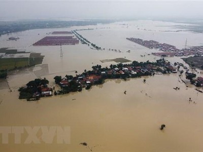 Cảnh ngập lụt sau những trận mưa lớn tại Bekasi, Tây Java, Indonesia. (Ảnh: AFP/TTXVN).