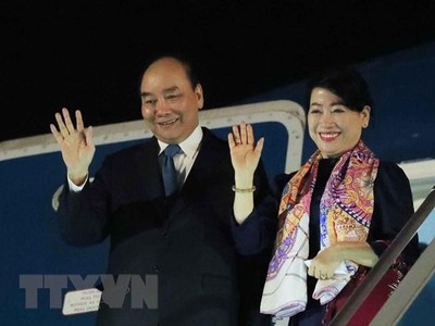 Chủ tịch nước Nguyễn Xuân Phúc và phu nhân. (Ảnh: Thống Nhất/TTXVN).