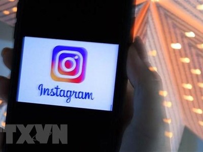 Biểu tượng ứng dụng Instagram trên màn hình điện thoại tại Arlington, Virginia, Mỹ. (Ảnh: AFP/TTXVN).