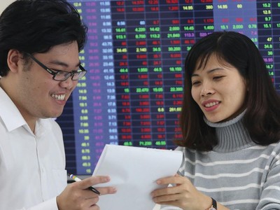 Thị trường chứng khoán tuần đầu năm phản ánh tích cực với thông tin về gói kích thích kinh tế.