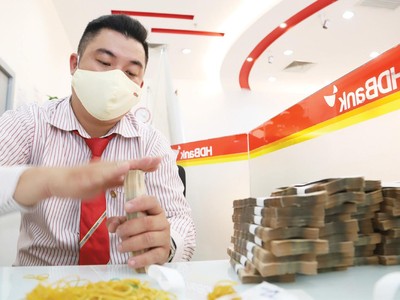 Ngành ngân hàng đã có 1 năm vượt khó thành công, tiếp tục đồng hành hỗ trợ doanh nghiệp hồi phục sản xuất - kinh doanh.