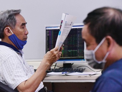 Thị trường chứng khoán luôn rất nhạy cảm với thông tin. Ảnh: Dũng Minh.