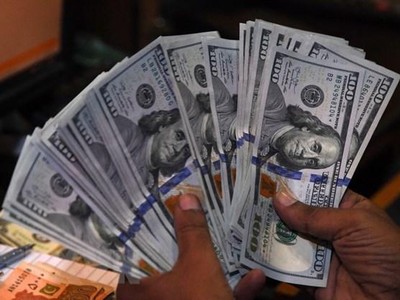 Đồng USD. (Ảnh: AFP/TTXVN)