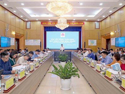 Phiên họp thẩm định Quy hoạch tỉnh Bình Phước chiều 24/11. (Ảnh: Đức Trung)