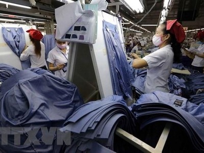 Sản xuất hàng dệt may xuất khẩu. (Nguồn: TTXVN)