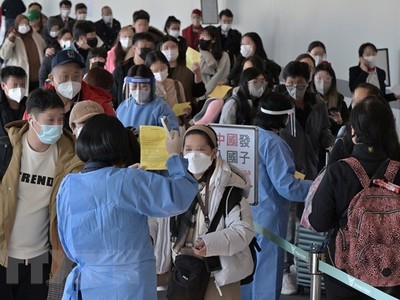 Khách du lịch chỉ cần khai báo kết quả xét nghiệm nhanh kháng nguyên âm tính với Hải quan Trung Quốc trước khi nhập cảnh. (Ảnh minh họa: Yonhap/TTXVN).