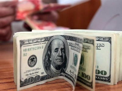 Đồng USD. (Ảnh: AFP/TTXVN)