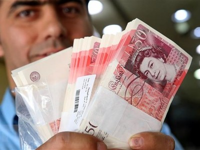 Đồng tiền mệnh giá 50 bảng Anh. (Ảnh: AFP/TTXVN)