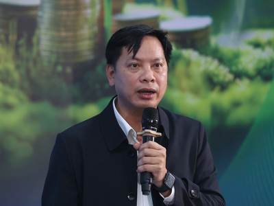 Ông Vương Văn Quý, Phó trưởng ban Chính sách tín dụng, Agribank trình bày tại hội thảo. Ảnh: Dũng Minh