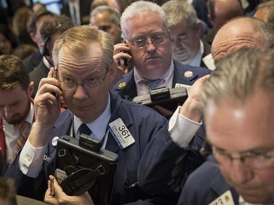 Phố Wall tăng mạnh sau văn bản cuộc họp của FED được công bố - Ảnh: Reuters