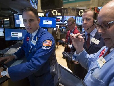 Phố Wall đảo chiều nhờ kết quả kinh doanh quý I/2014 - Ảnh: Reuters