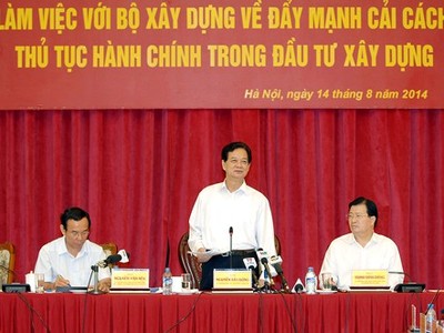 Thủ tướng Chính phủ Nguyễn Tấn Dũng làm việc với Bộ Xây dựng - Ảnh: VGP