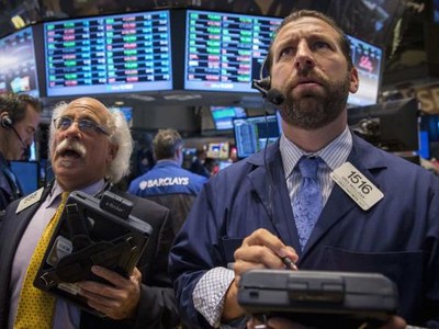 Phố Wall có phiên giao dịch đầu tuần khá yên ắng khi giới đầu tư đang hướng sự tập trung vào các sự kiện quan trọng sắp diễn ra - Ảnh: Reuters