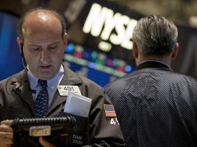 Phố Wall có phiên khởi sắc sau thông tin về khả năng FED chưa sớm tăng lãi suất - Ảnh: Reuters