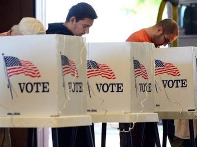  Cử tri Mỹ bỏ phiếu. Ảnh: Reuters