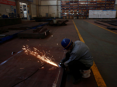 Công nhân trong một nhà máy của Trung Quốc. Ảnh:Reuters