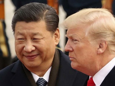 Tổng thống Mỹ Donald Trump (phải) và Chủ tịch Trung Quốc Tập Cận Bình trong cuộc gặp ở Bắc Kinh năm 2017. Ảnh:Reuters.