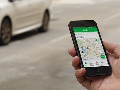 Xe Grab đang được thí điểm là xe hợp đồng điện tử. Ảnh:Xuân Hoa.
