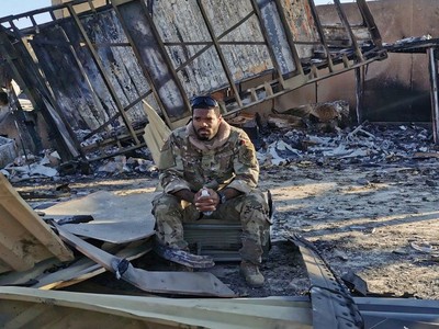 Lính Mỹ tại căn cứ Ain al-Asad sau cuộc tấn công hôm 8/1. Ảnh: CNN.