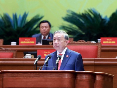 Tổng Bí thư Tô Lâm trình bày báo cáo về các văn kiện tại Đại hội XIV - Ảnh TTXVN .