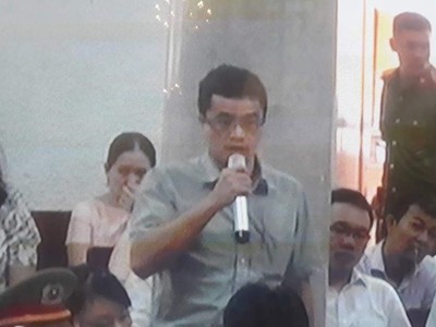 Ông Quang tại phiên tòa sơ thẩm.