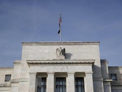 Fed cam kết duy trì chính sách tiền tệ nới lỏng