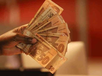 Zimbabwe tung ra đồng nội tệ mới được hỗ trợ bởi vàng
