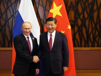Tổng thống Nga Vladimir Putin và Chủ tịch Trung Quốc Tập Cận Bình. Ảnh: AFP.