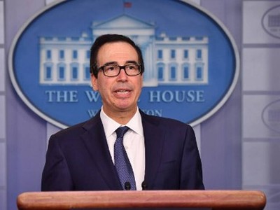 Bộ trưởng Tài chính Mỹ Steven Mnuchin tại cuộc họp báo hôm 16/10. Ảnh: AFP.